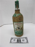 Vintage rattan covered tequila bottle
