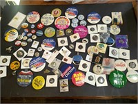 Large collection of vintage pins, buttons, and