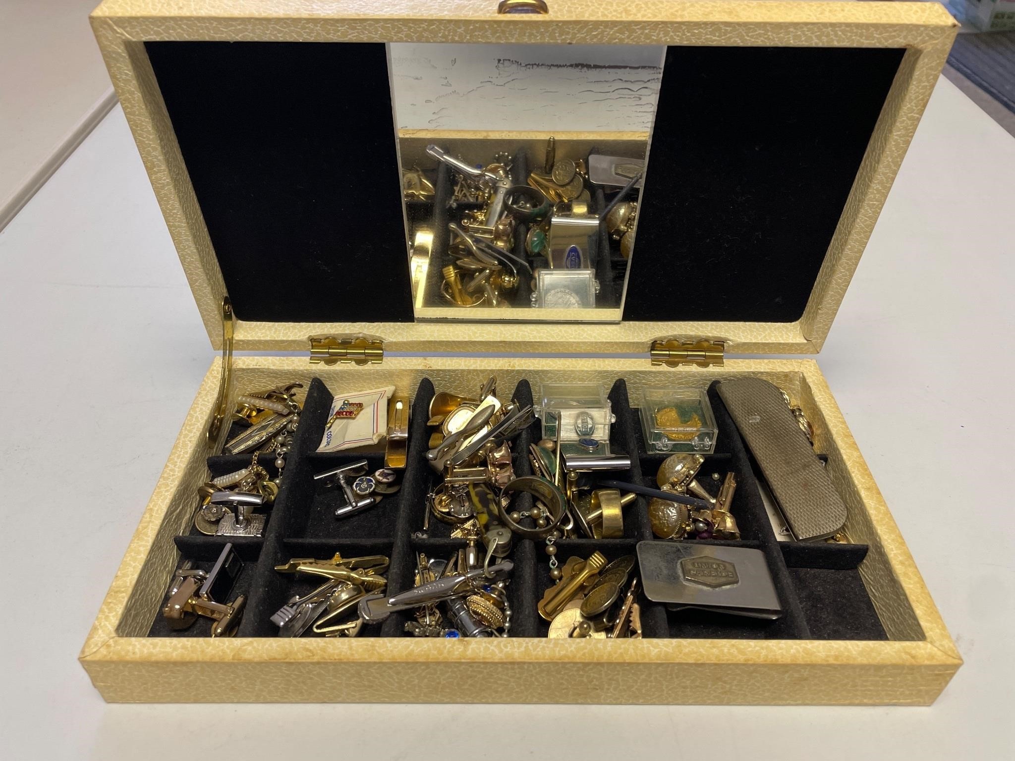 Vintage jewelry box with cuff links and tie clips