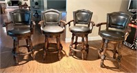 4 Swivel Leather Barstools in Basement