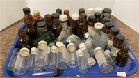 Tray of assorted medical medicine bottles as well