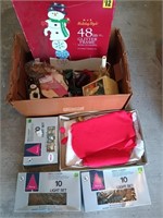 Box of assorted Christmas decor