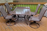 Deck table, 4 swivel rocking chairs