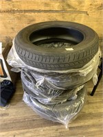 Lot with 4 Bridgestone's Duel H/T tires size P 245