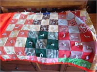 BLOCK PATTERN WITH YARN TIES QUILT