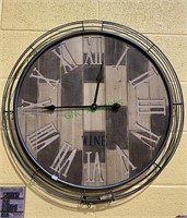 Large carved wood wall clock, marked wine, with a