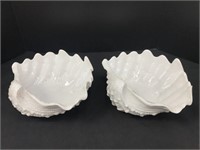 2 white ceramic clamshell dishes