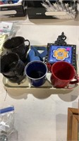 Enamel cups and trivets