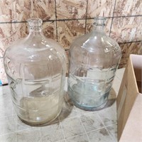 2- Large glass jugs