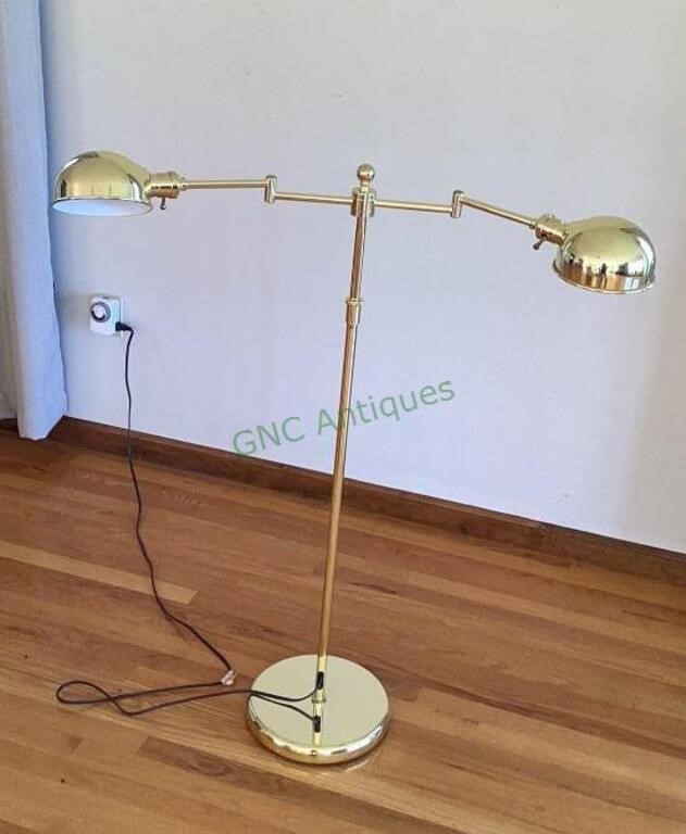 Unique brass tone metal floor lamp with