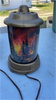 Vintage motion lamp of fire in the forest