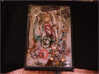 Large container of costume jewelry: glass beads,