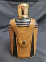 Glass flask with cover