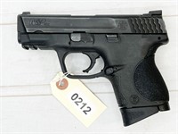 S&W M&P40c 40ca pistol, s#HTB5536 - background