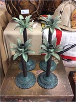 Four piece palm tree candle holders