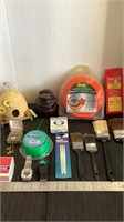 Various paint brushes, trim line, watches,