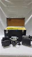 Vintage cameras in case