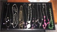 A SELECTION OF 9 NECKLACES, 3 EARRINGS, AND 2