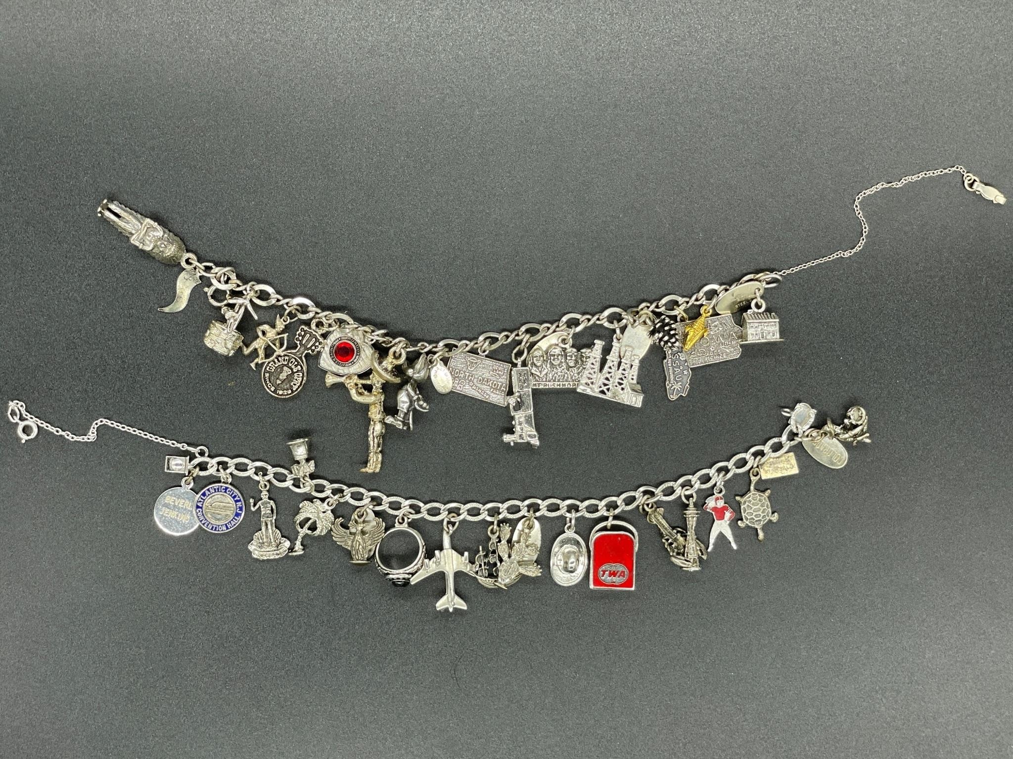 2 - bracelets w/ many sterling silver charms