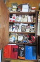 Contents of cabinet that includes repair manuals,