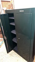 Stack on metal gun safe with keys in basement