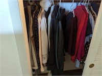 Closet of assorted women's clothing