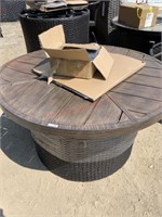 Fire pit table with stones