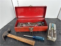 Red metal toolbox with contents