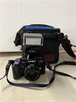 Minolta 7000 camera with flash and a nice