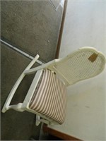 Cane back rocking chair.
