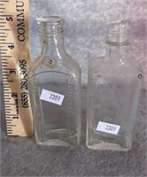 (2) CLEAR GLASS BOTTLES