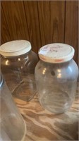 Two Glass Storage Jars