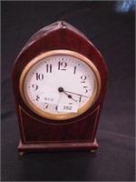 A French mahogany cathedral-style 8" clock,