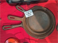 Trio of cast skillets