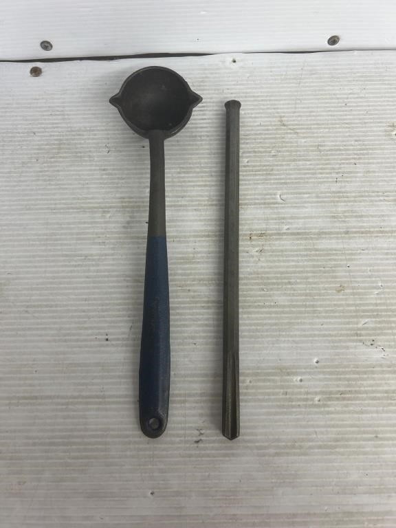 Cast iron ladle and metal stake