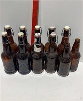 9 Brown Glass Flip Top Bottles - 2 Sioux City