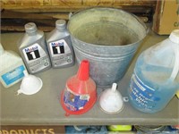 oil, funnels, wash in bucket