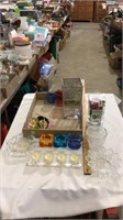 Candles, colored tea light holders, glass dishes