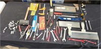 Lot of tools in a plastic bin