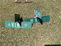 GOLD AND VINE STREET SIGN AND REEVES AND MAY SIGN