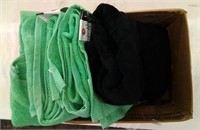 3 green and 1 black bath towels