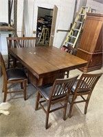 Bar style table with 4 chairs and bench