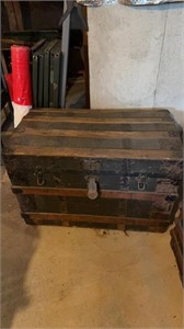 Large antique flat top steamer trunk, with the