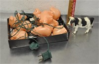 Plastic cow, piggy string lights, tested