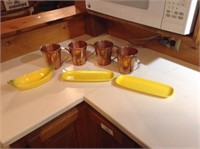Copper Mule mugs and yellow dishes
