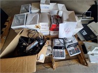 Pallet of Hair Trimmers and calculators