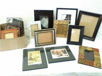 Group of various picture frames some with