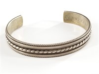 Sterling silver cuff bracelet with intricate front