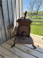 Antique cast iron wood burning stove