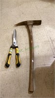 Two pieces - one is a large landscaping tool with